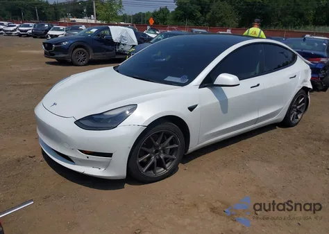 2022 Tesla Model 3 Rear-Wheel Drive from USA, damaged, VIN 5YJ3E1EA9NF122211